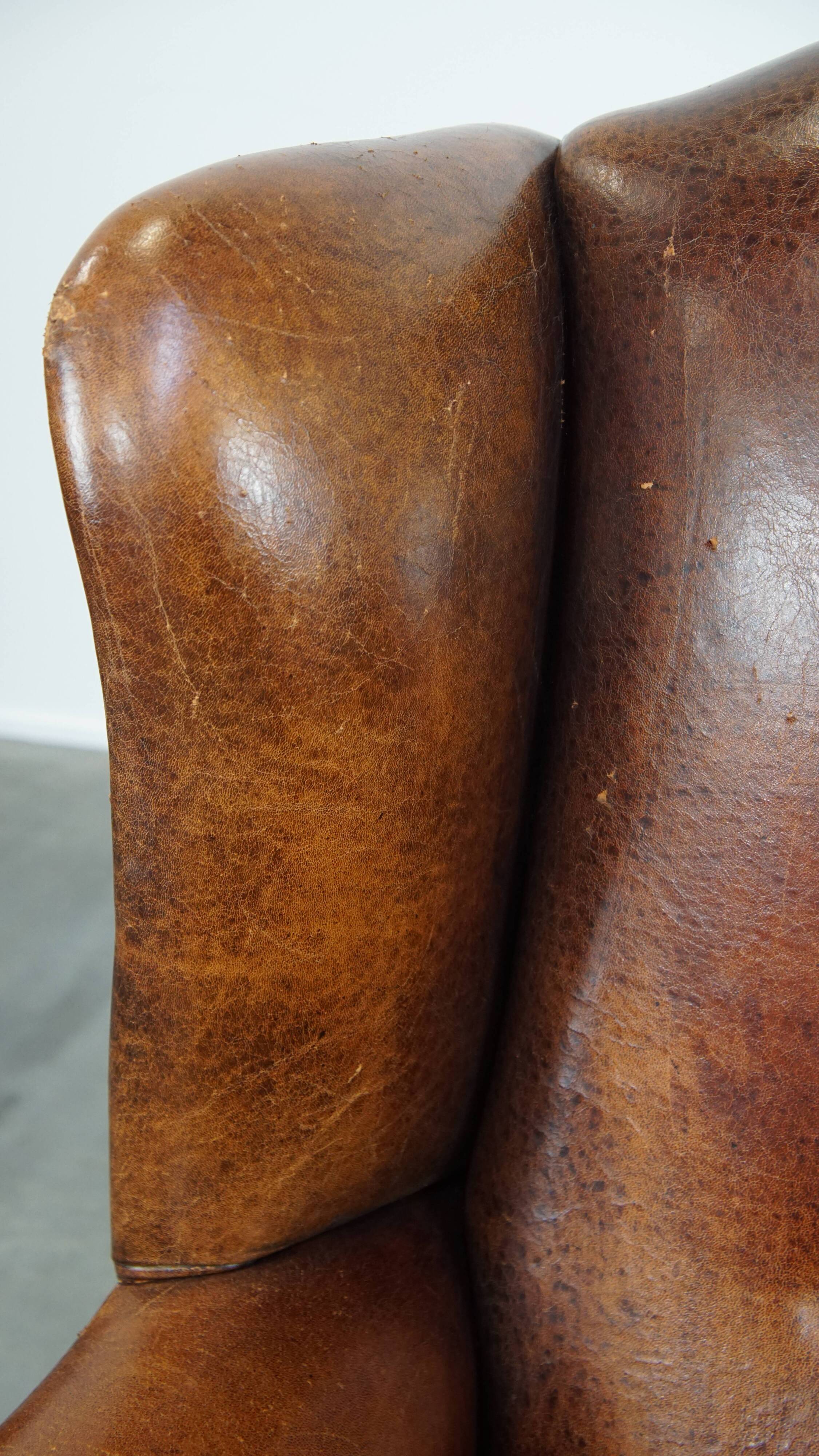 Fauteuil à oreilles en cuir de mouton vintage de style anglais