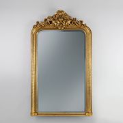 Baroque mantel mirror in carved wood and gilded plaster, France circa 1850.