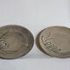 Duo of ceramic plates decorated with vintage foliage