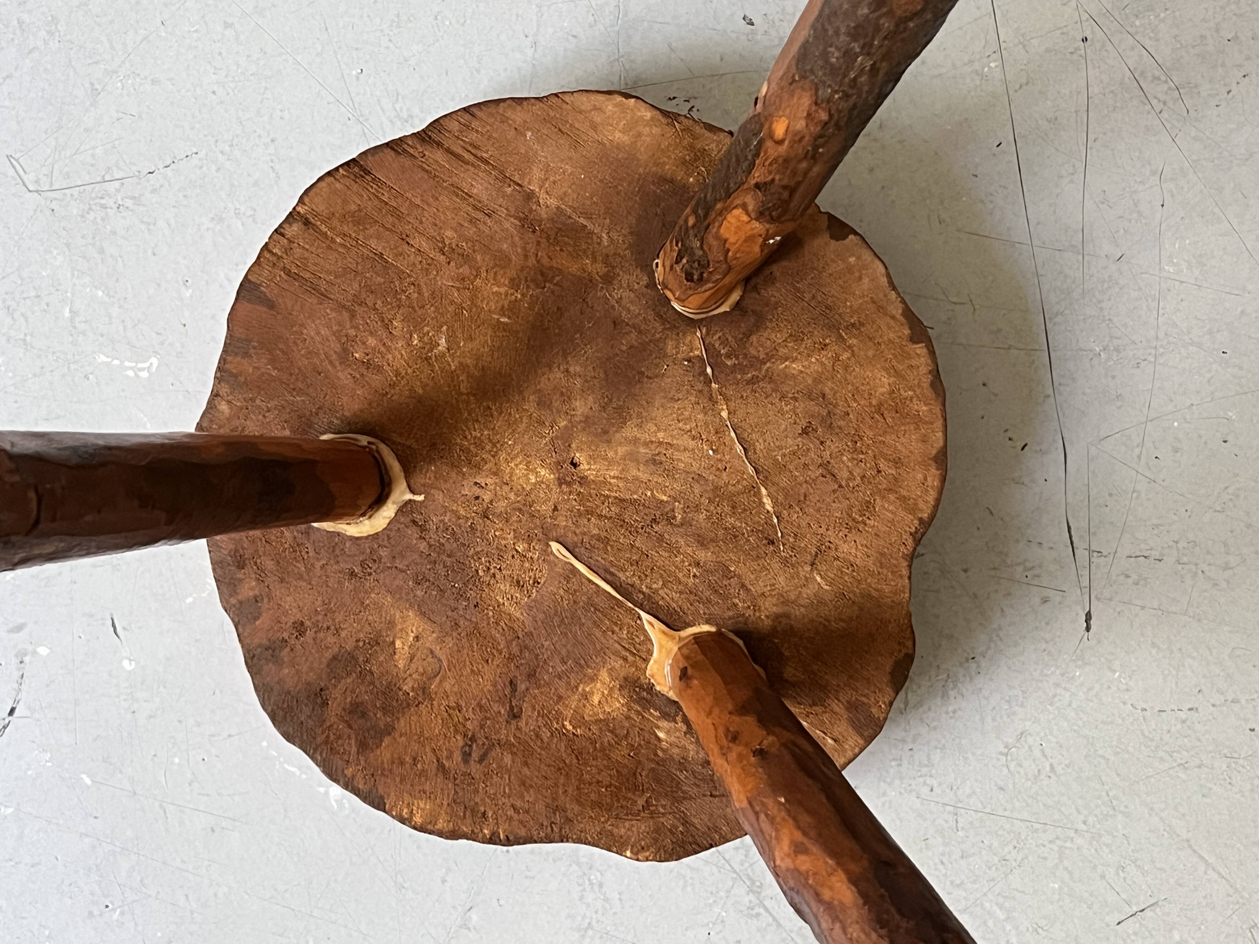 brutalist solid wood tripod stool, France circa 1960