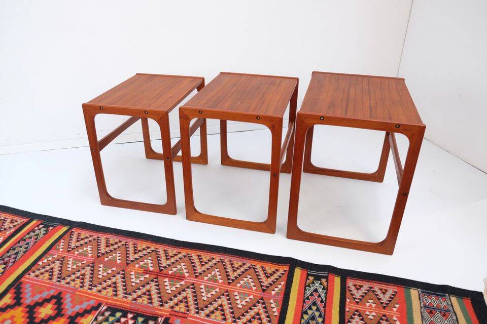 Nest tables in 1960s style, in gel-stained teak.