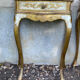 Pairs of Florentine bedside tables in gilded wood.