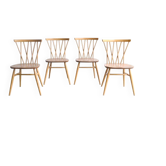 Set of four "candlestick" chairs by Lucian Ercolani