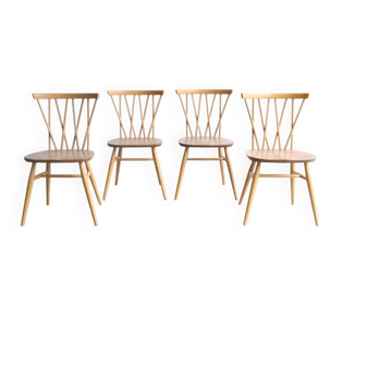 Set of four "candlestick" chairs by Lucian Ercolani
