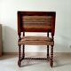 Ancien fauteuil "caqueteuse" de style Louis XIII
