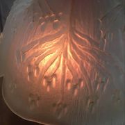 Abat jour in amber glass in the shape of a flower.
