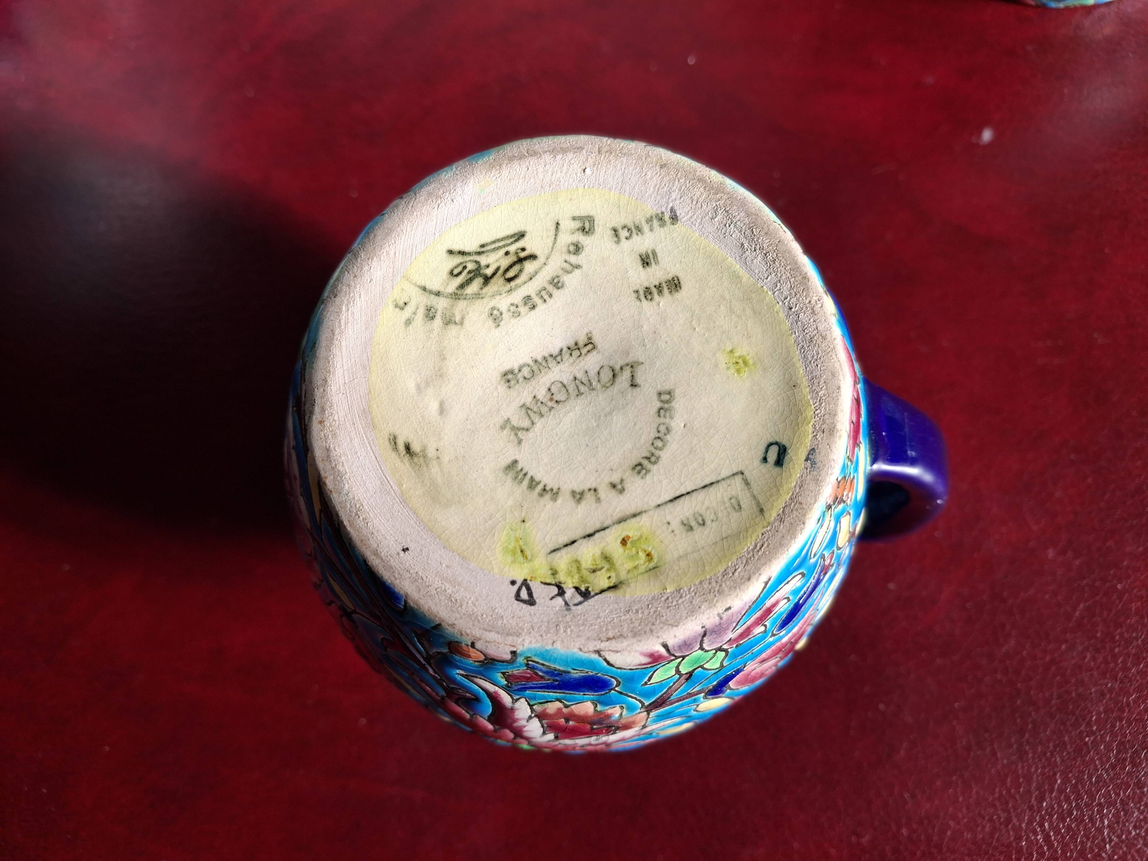 Cloisonné enamel tea service from Longwy in excellent condition.