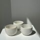 Trio of white ceramic cups D9cm