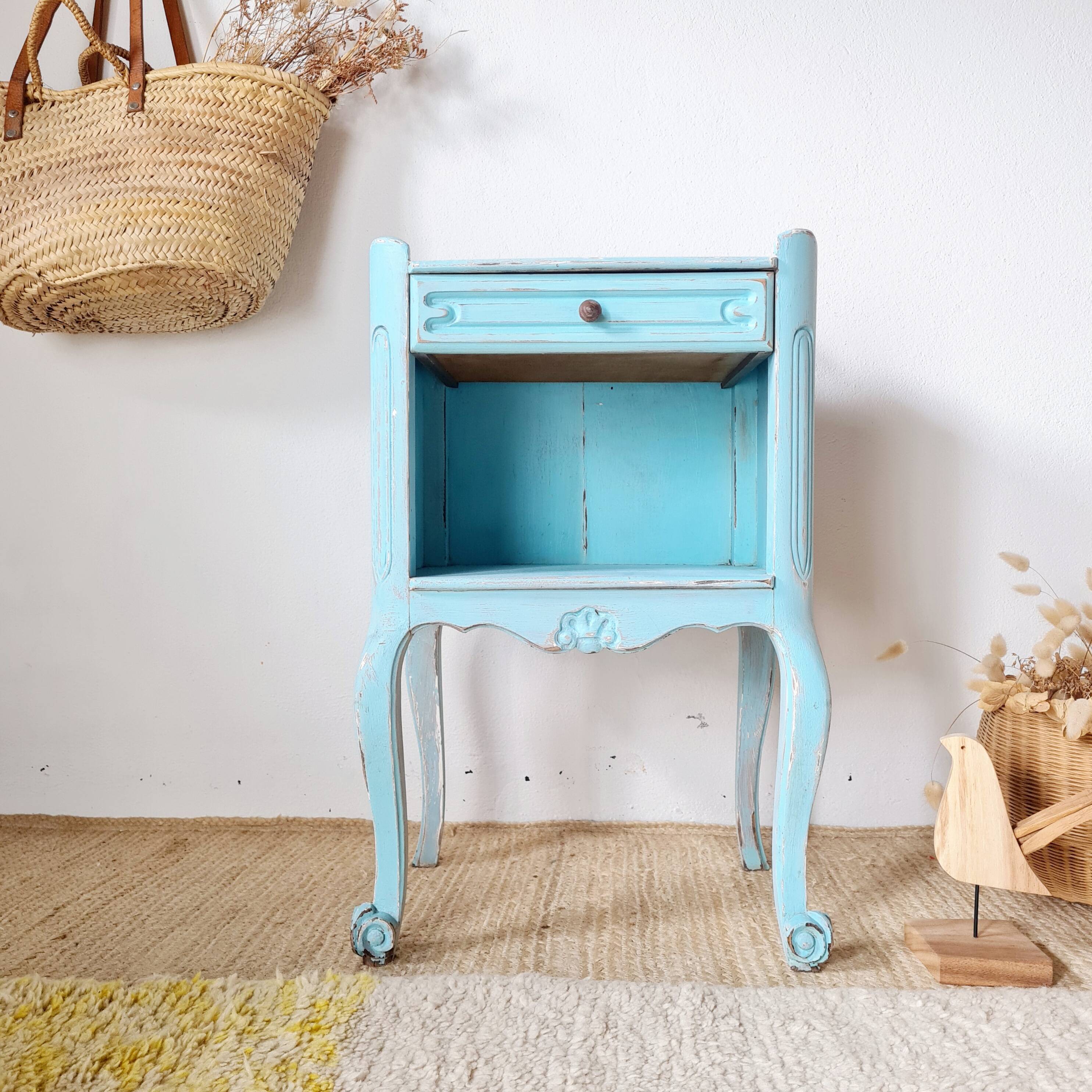 Small vintage bedside table in azure blue patina.
