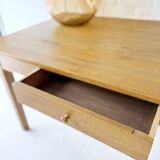 Wooden table with drawer