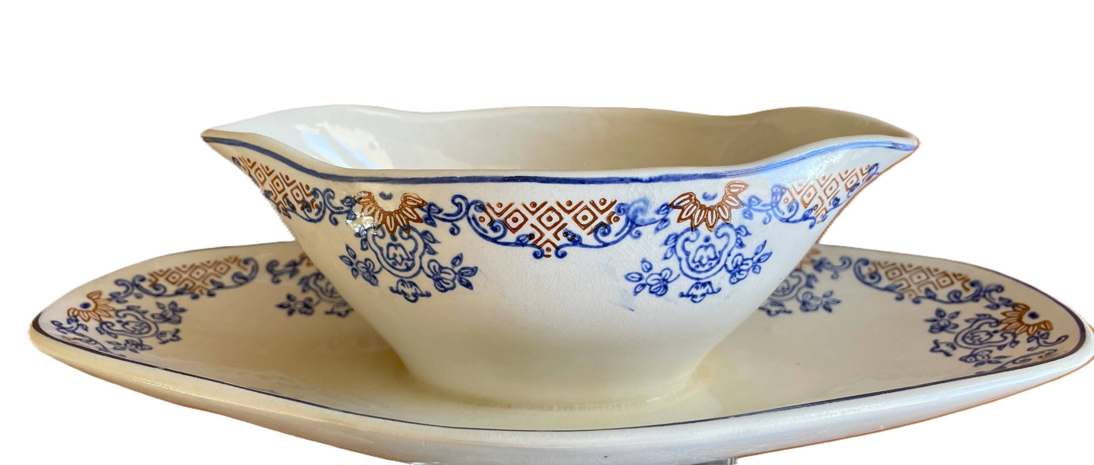 Antique Longwy earthenware sauceboat
