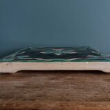 Art Nouveau trivet, glazed ceramic, signed