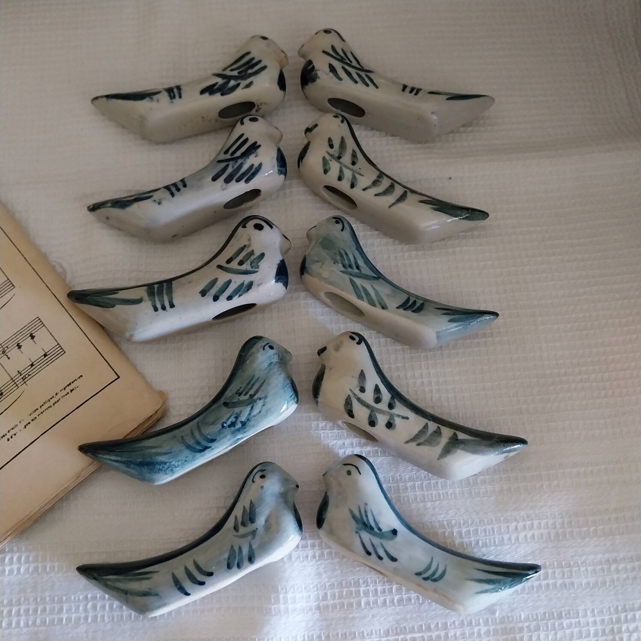 Ceramic knife rest in the shape of birds.