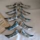 Ceramic knife rests in the shape of birds
