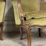 Pair of louis xv style armchairs in carved beech around 1920