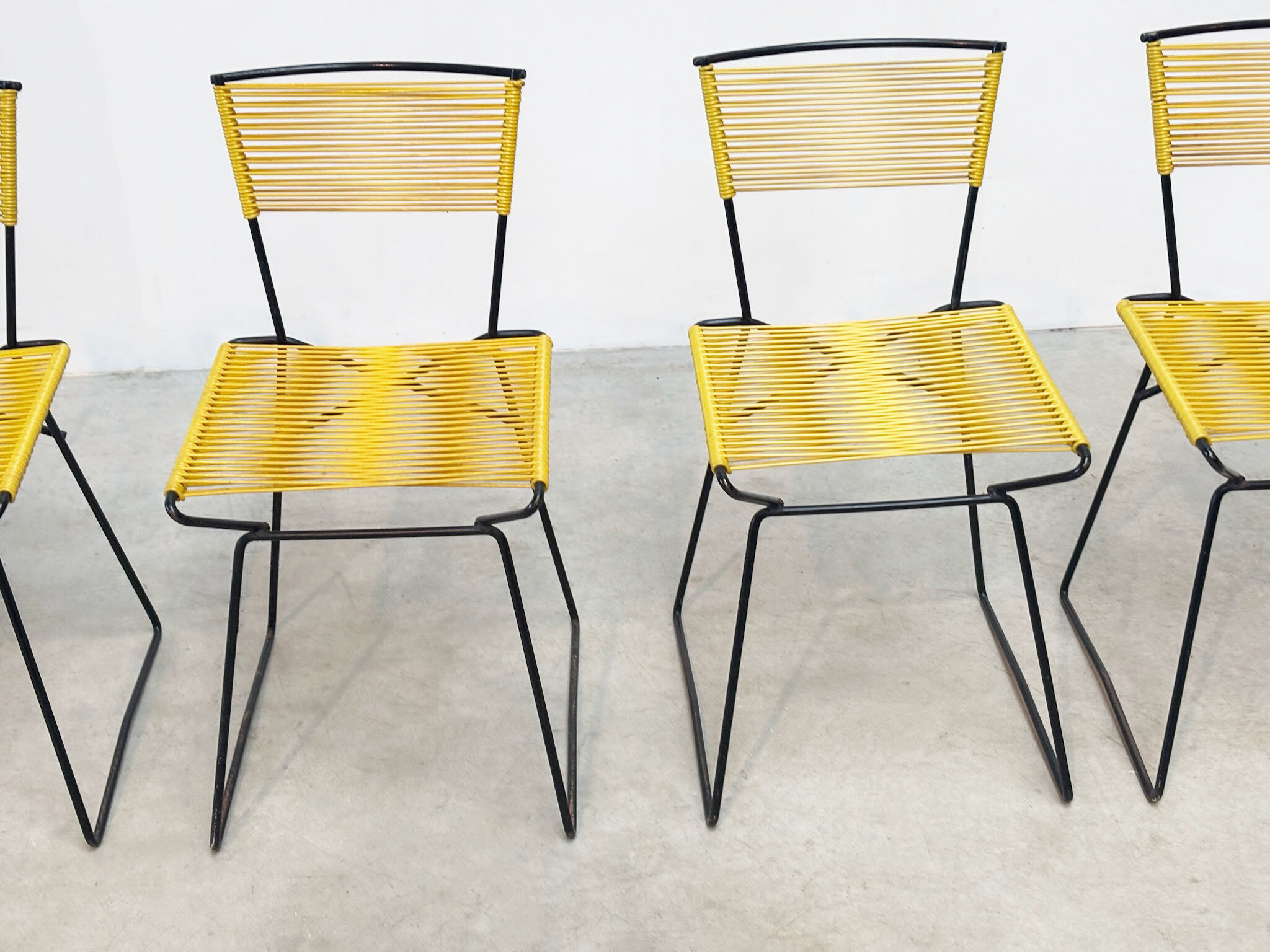 Set of six 'Spaghetti' dining chairs