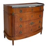 The demi-lune commode/ chest of drawers