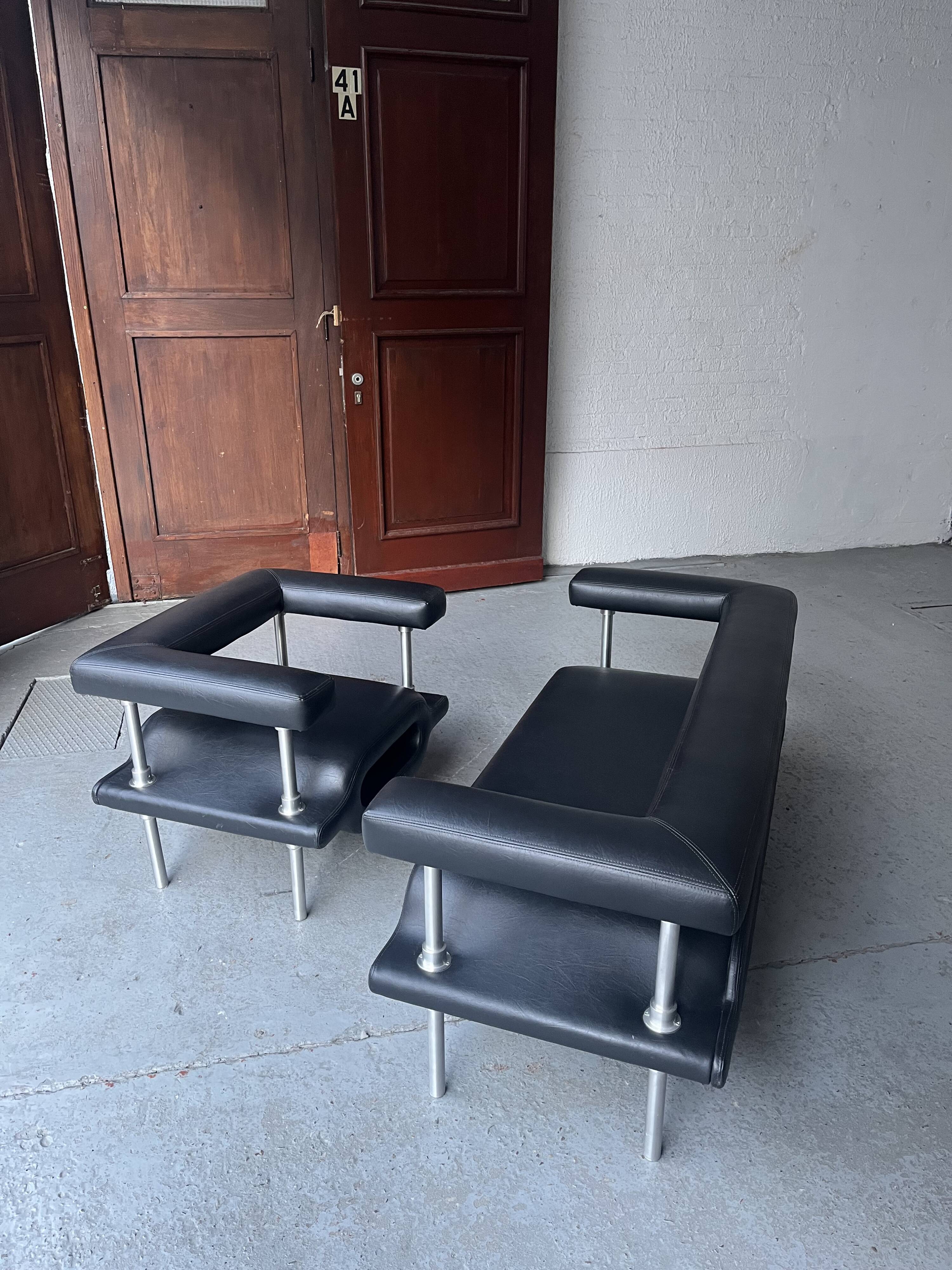 ‘Magazine’ easy chair and 2-seater by Michael Young