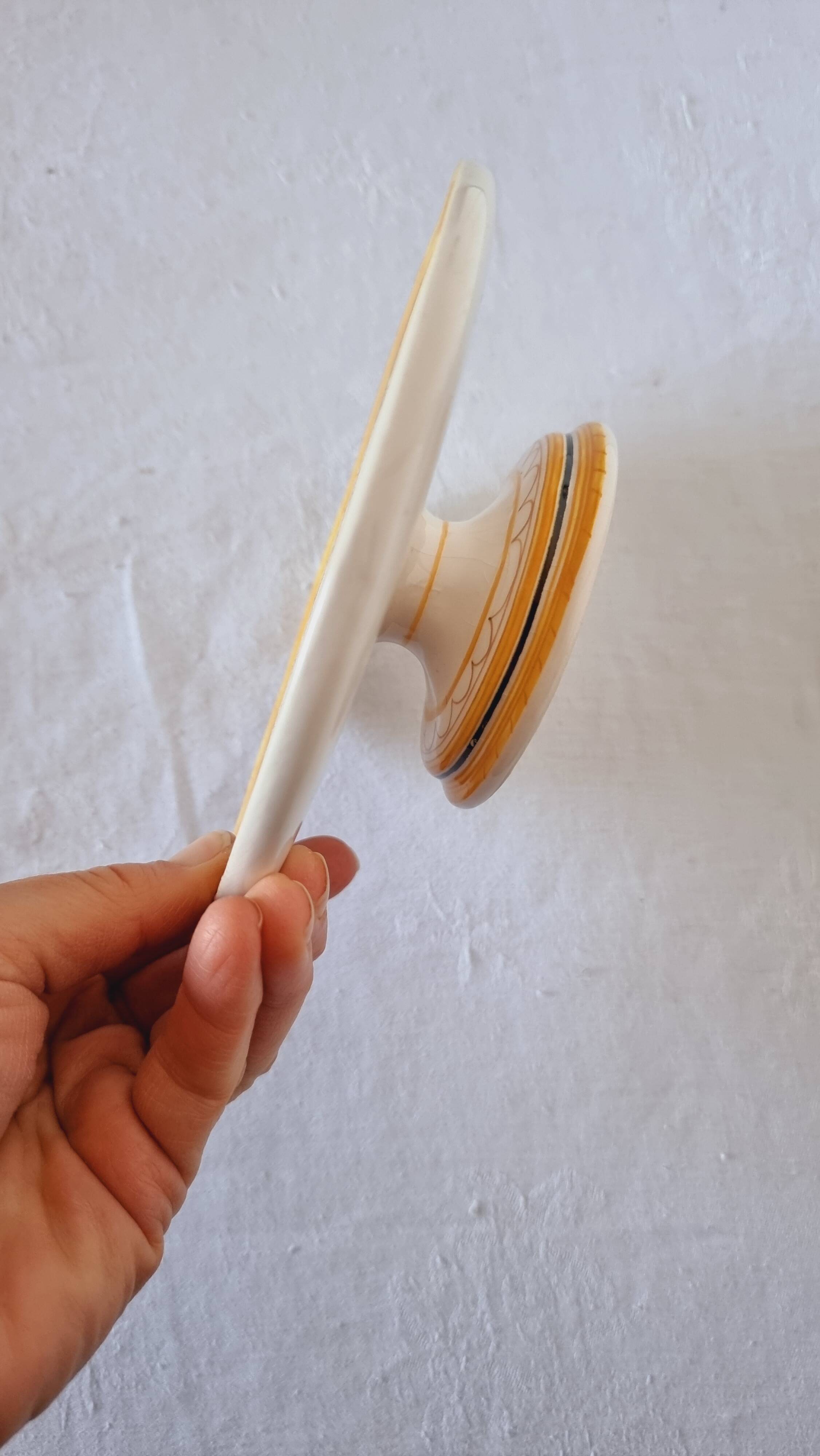 Vintage Italian raised plate in hand-painted ceramic.