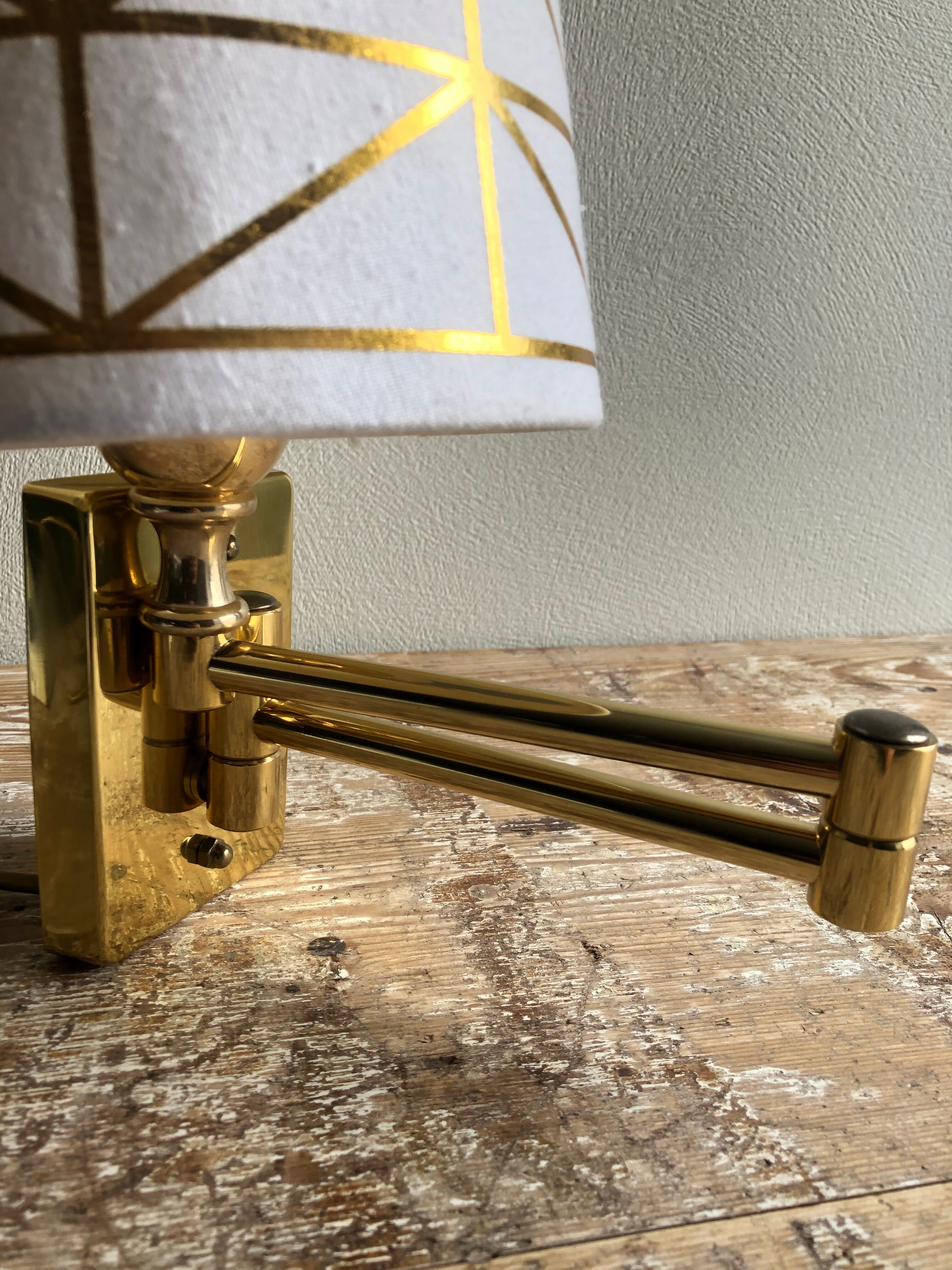 Deschuytener brass articulated wall lamp