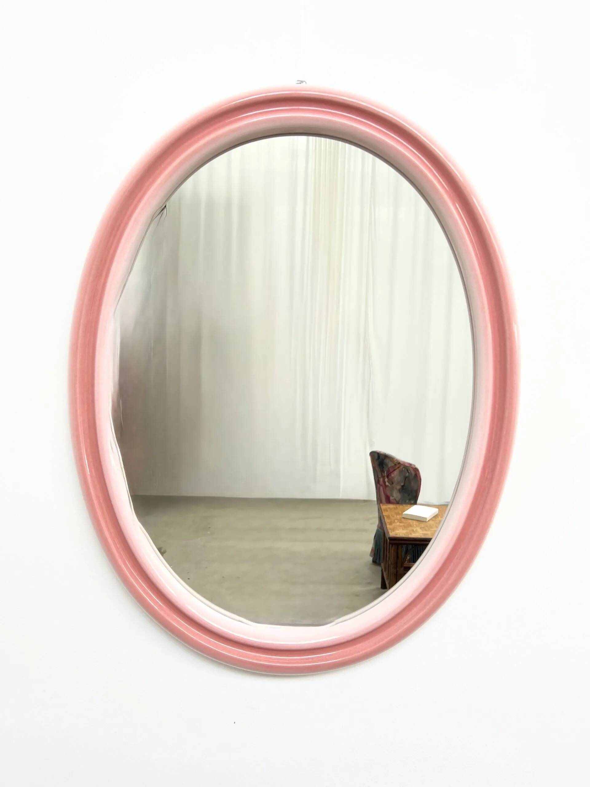 Large oval pink ceramic mirror (76cm) – vintage Italian design