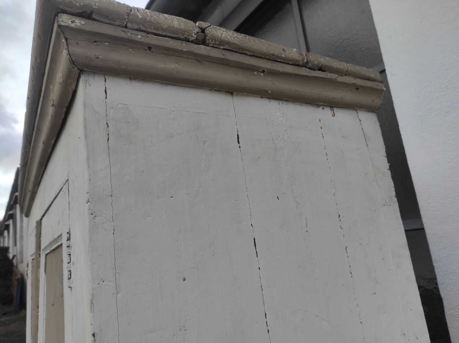 Old rustic Parisian wardrobe patinated in oak and fir