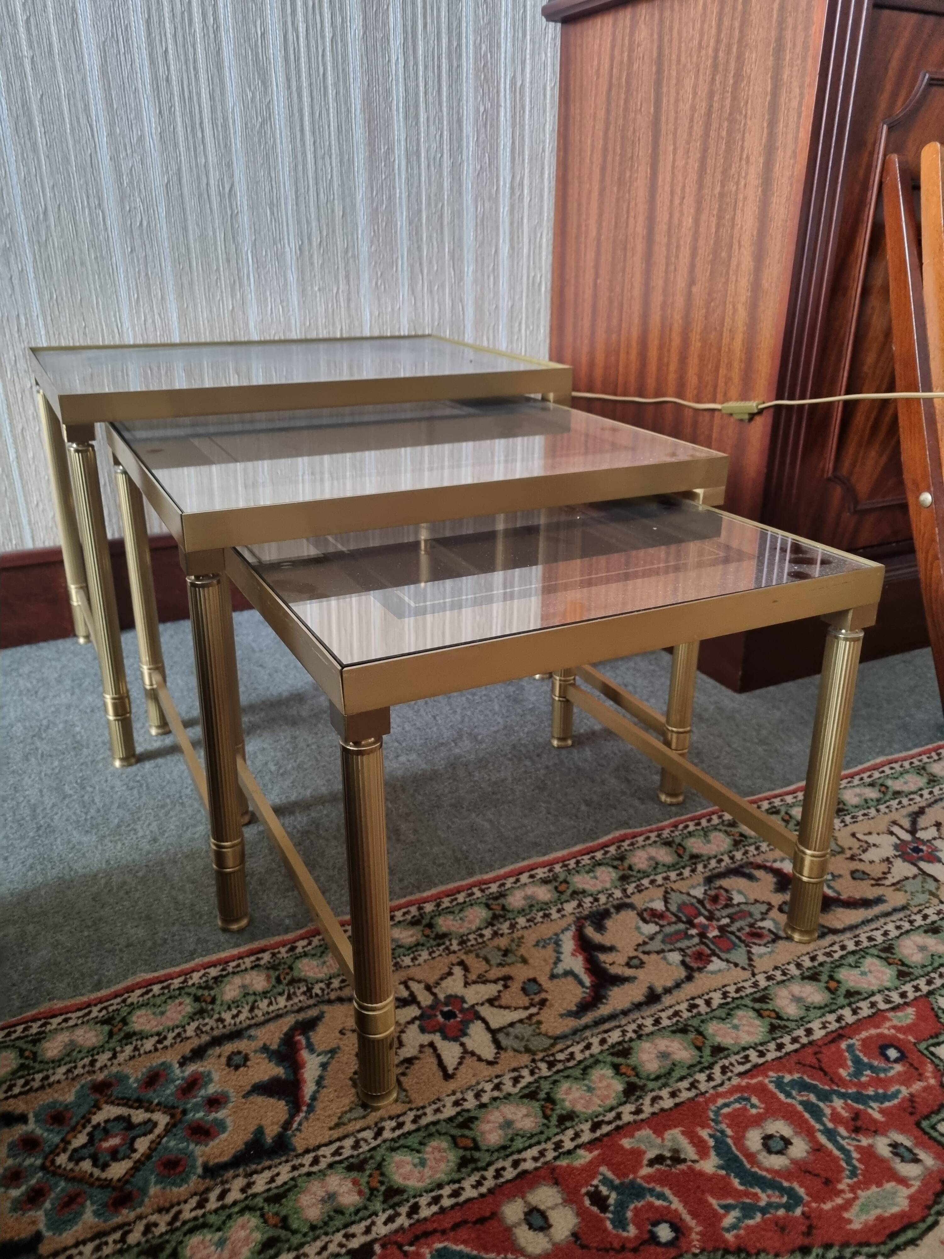 Set of three nesting tables in brass and glass
