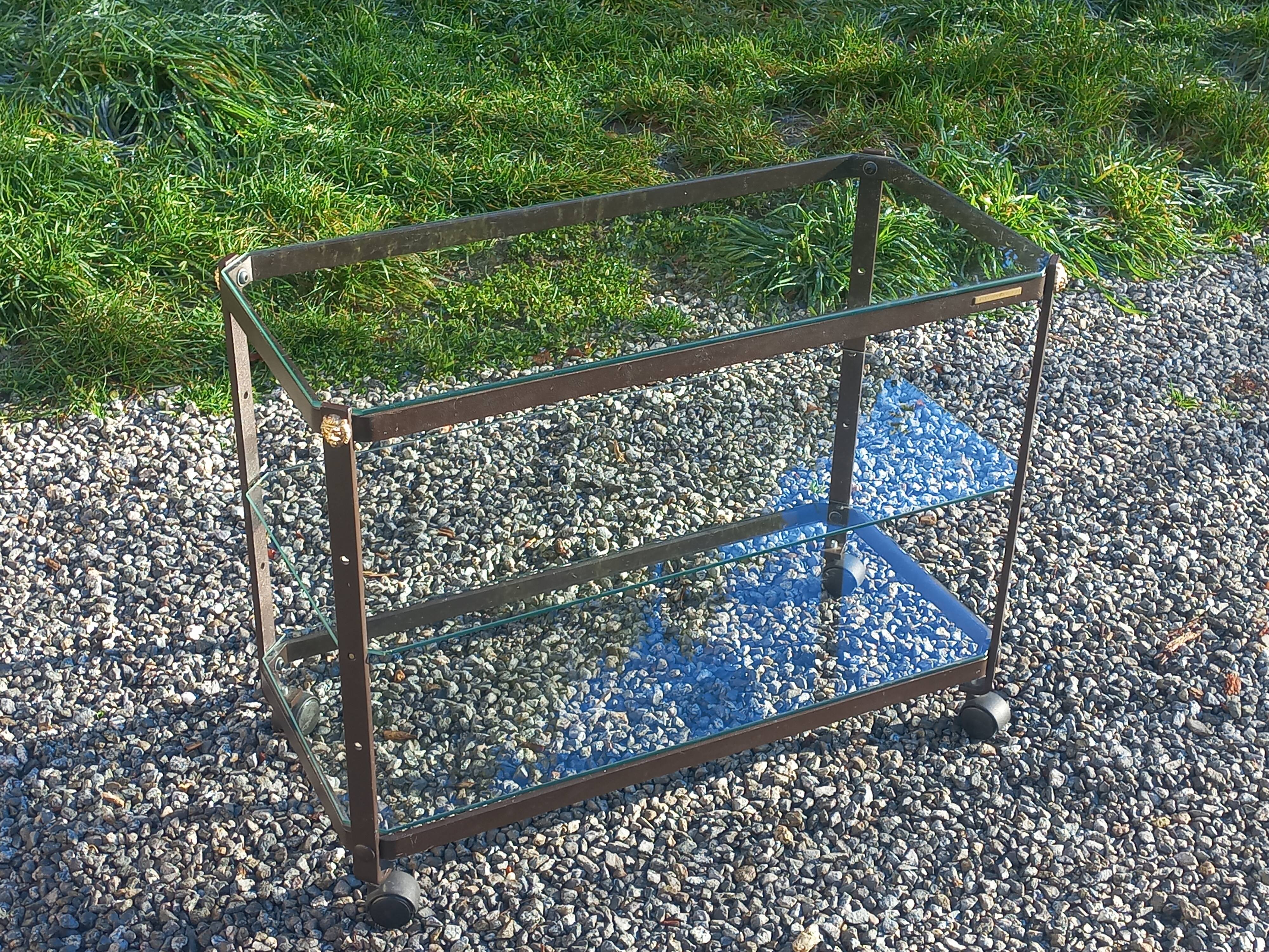 Rolling dessert trolley designed by Pierre Vandel