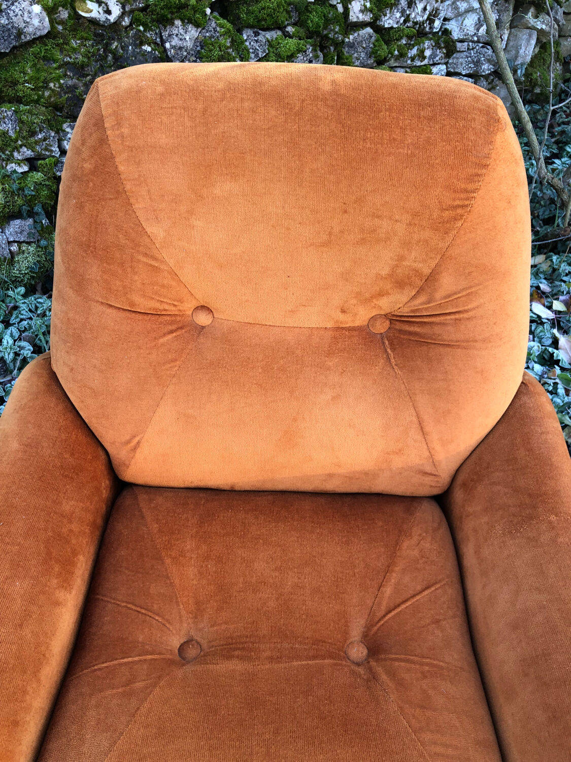 Orange velvet armchair