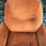 Orange velvet armchair