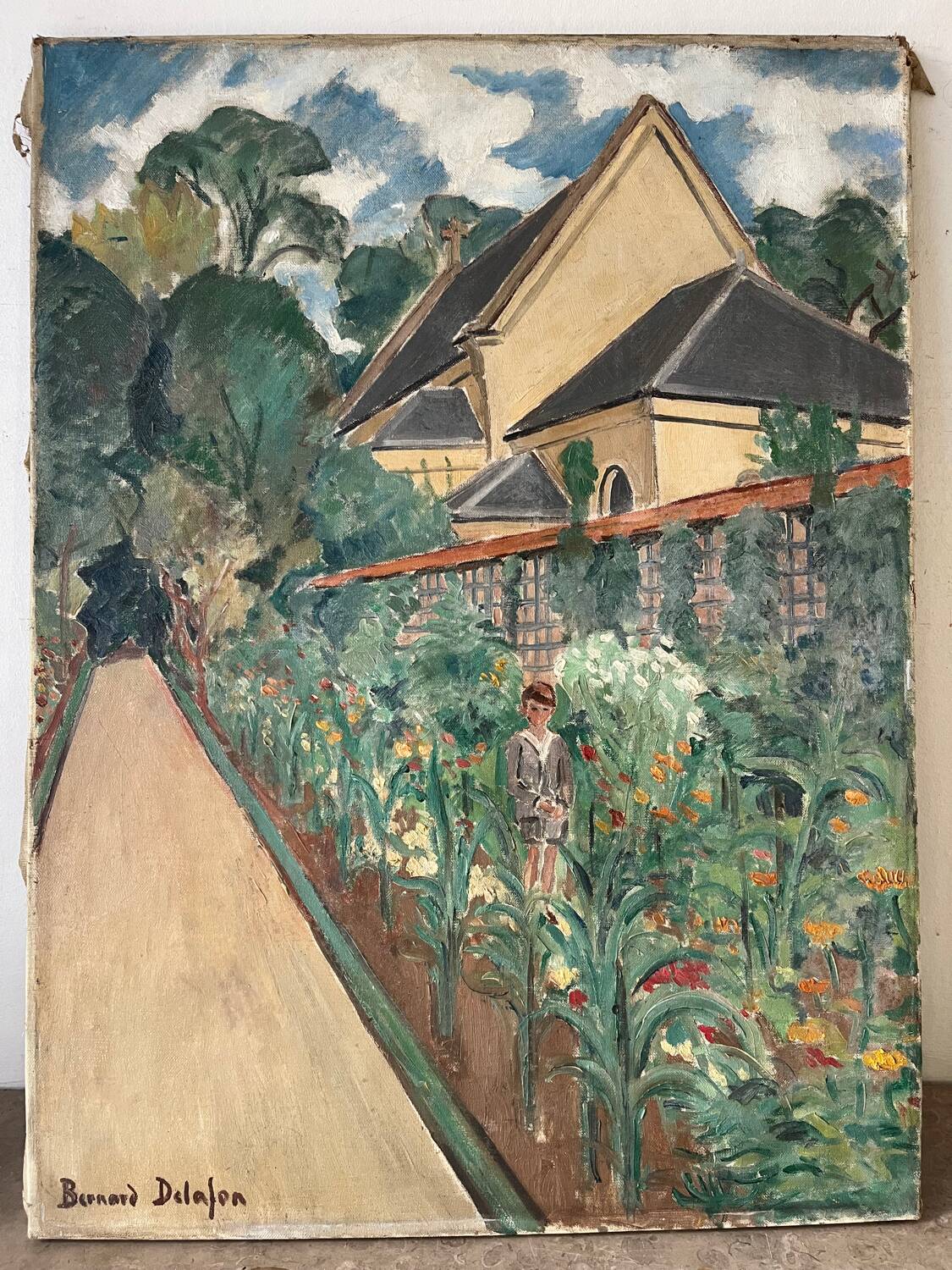 Country house with young man, signed Bernard Delafon