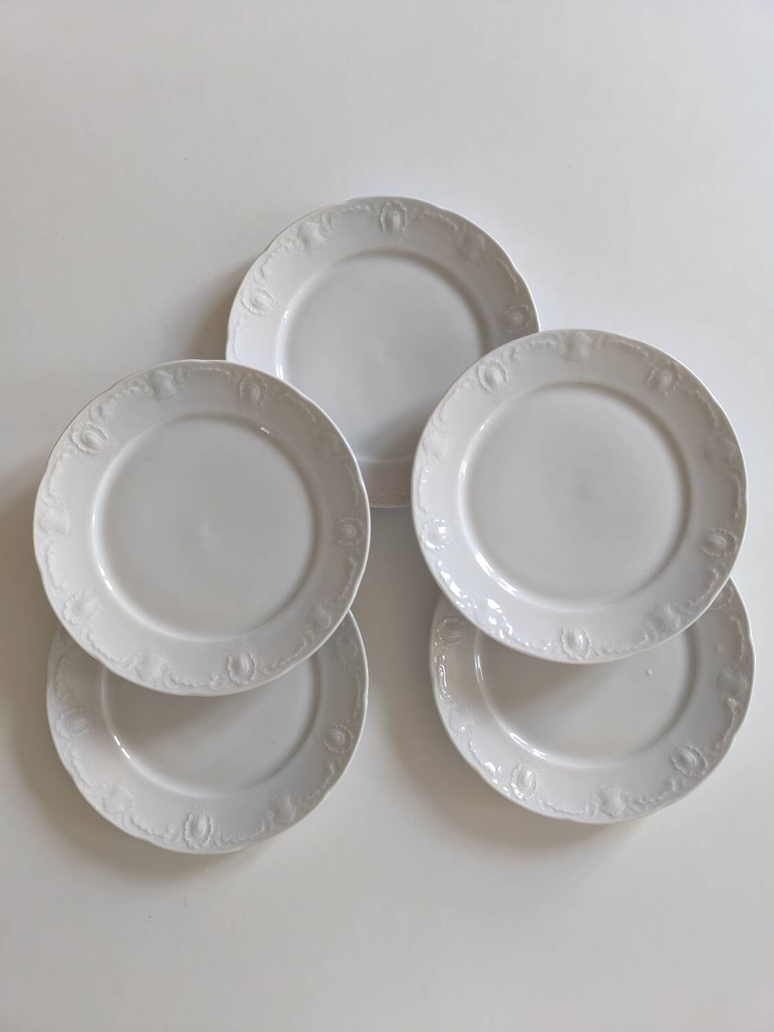 Set of five porcelain dessert plates