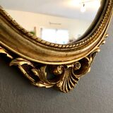 Oval gilded mirror baroque style