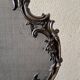 Spark screen, fire screen, bronze fireplace screen decorated with a covered cherub