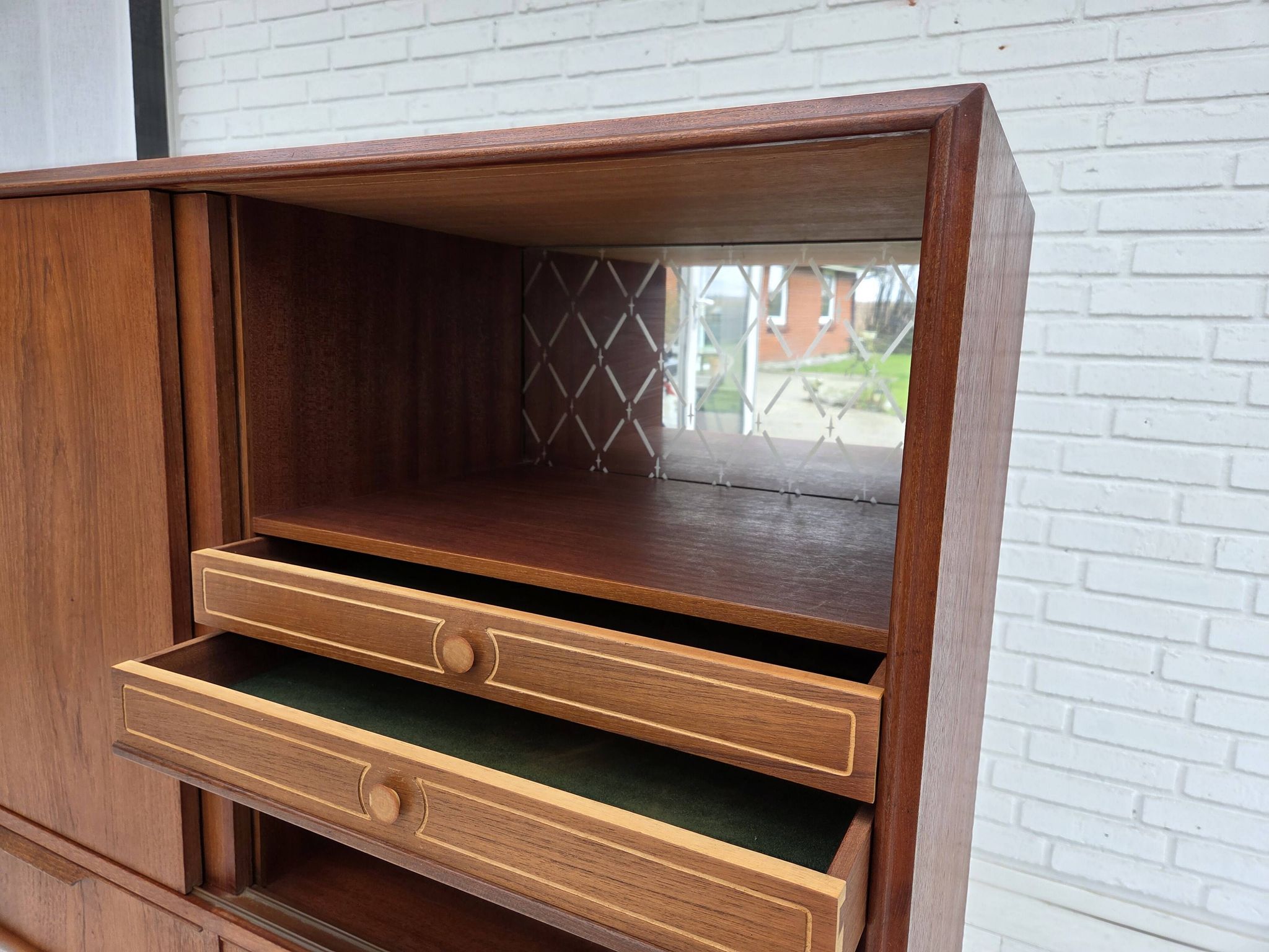 1960s, Danish chest of drawers, teak wood, mirror inside, sliding doors.