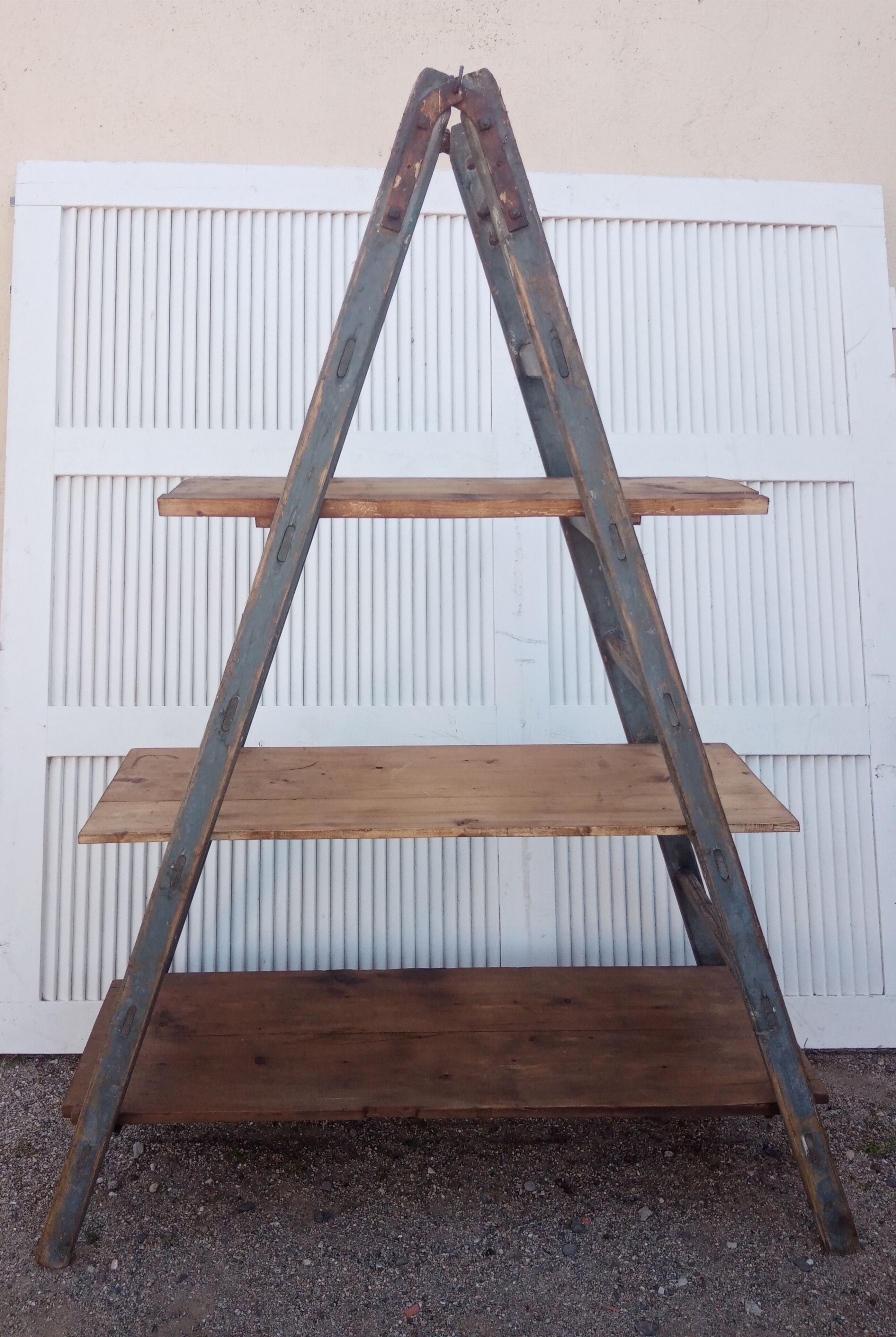 Old stepladder wooden shelf