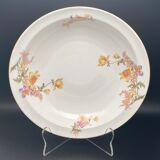 Round hollow Limoges dish with small yellow and purple flower patterns
