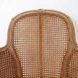 Louis XV style carved armchair with double sided cane work on the side panels