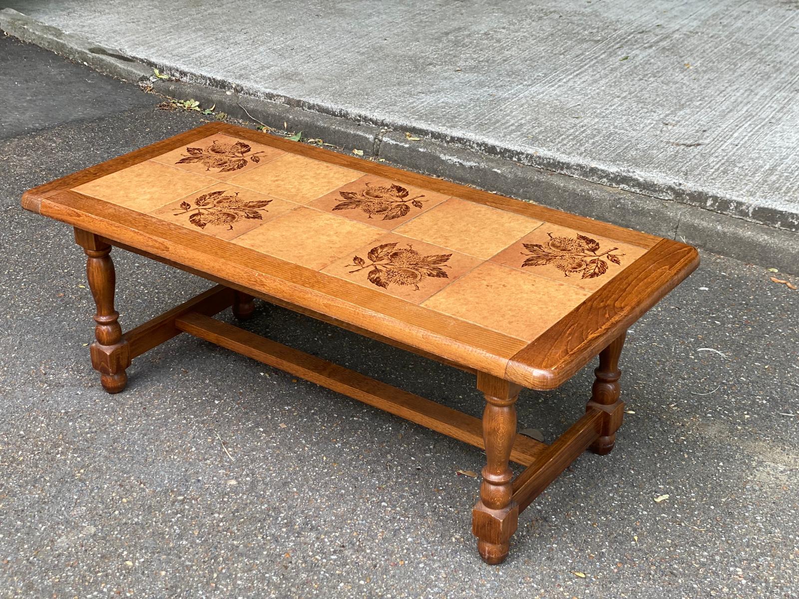Solid wood and ceramic coffee table from the 1970s.