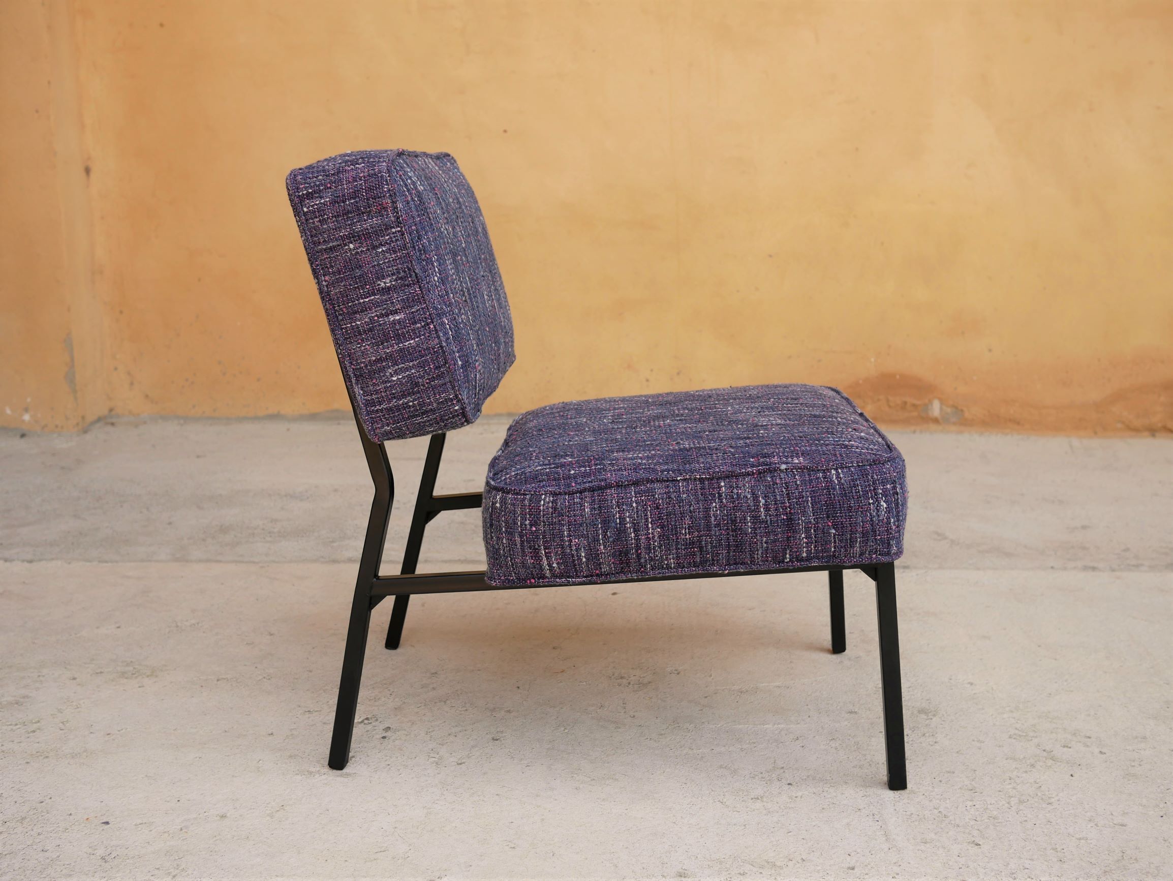 Vintage modernist metal foot armchair