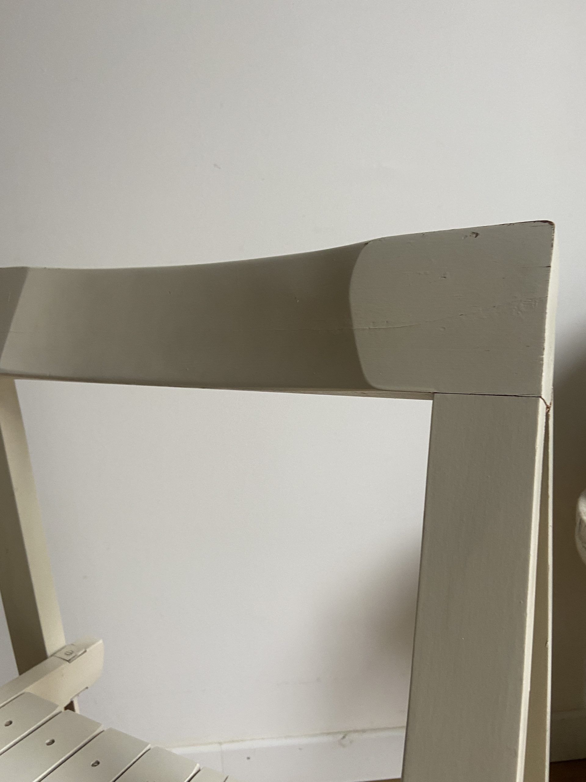 White folding vintage chair