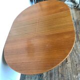 Large Scandinavian round table with 2 extensions, entirely made of teak