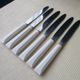 Set of 6 vintage Pradel 255 stainless steel and white bakelite table knives