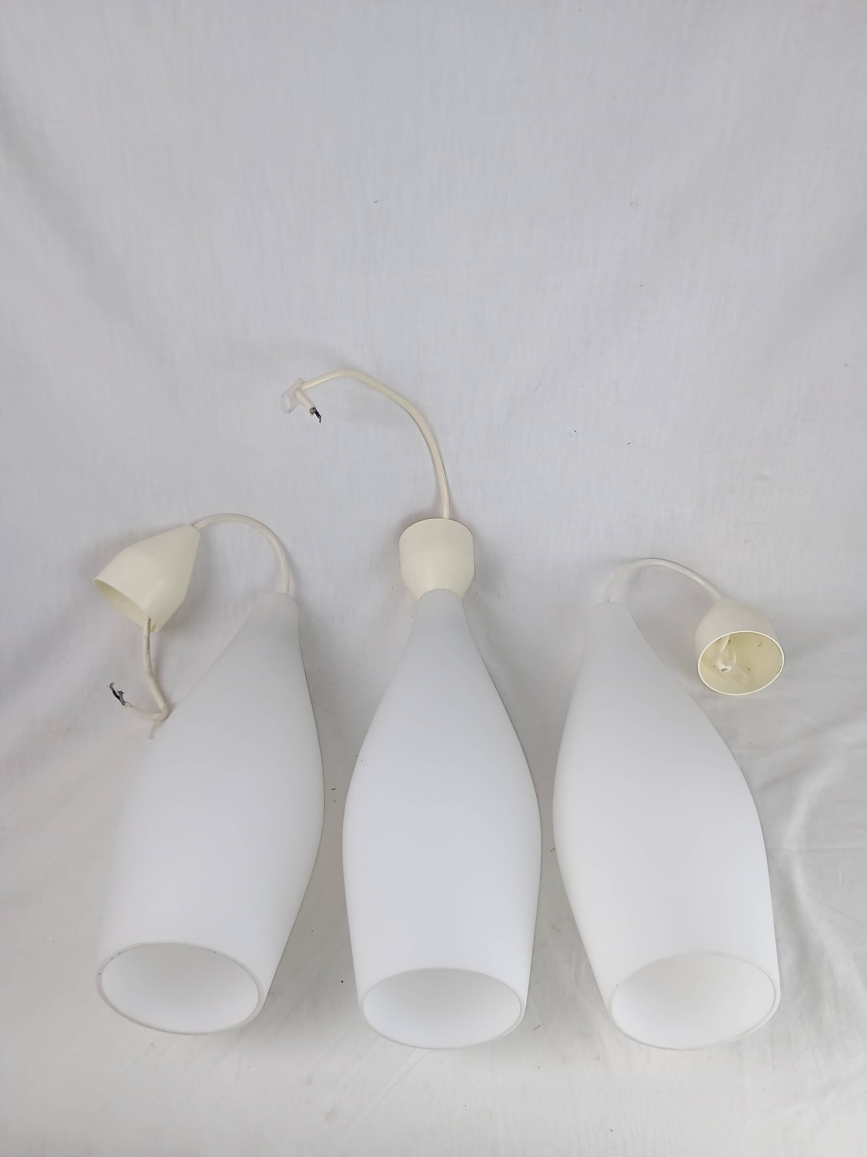 Superb set of three Holmegaard white opaline glass pendant lights