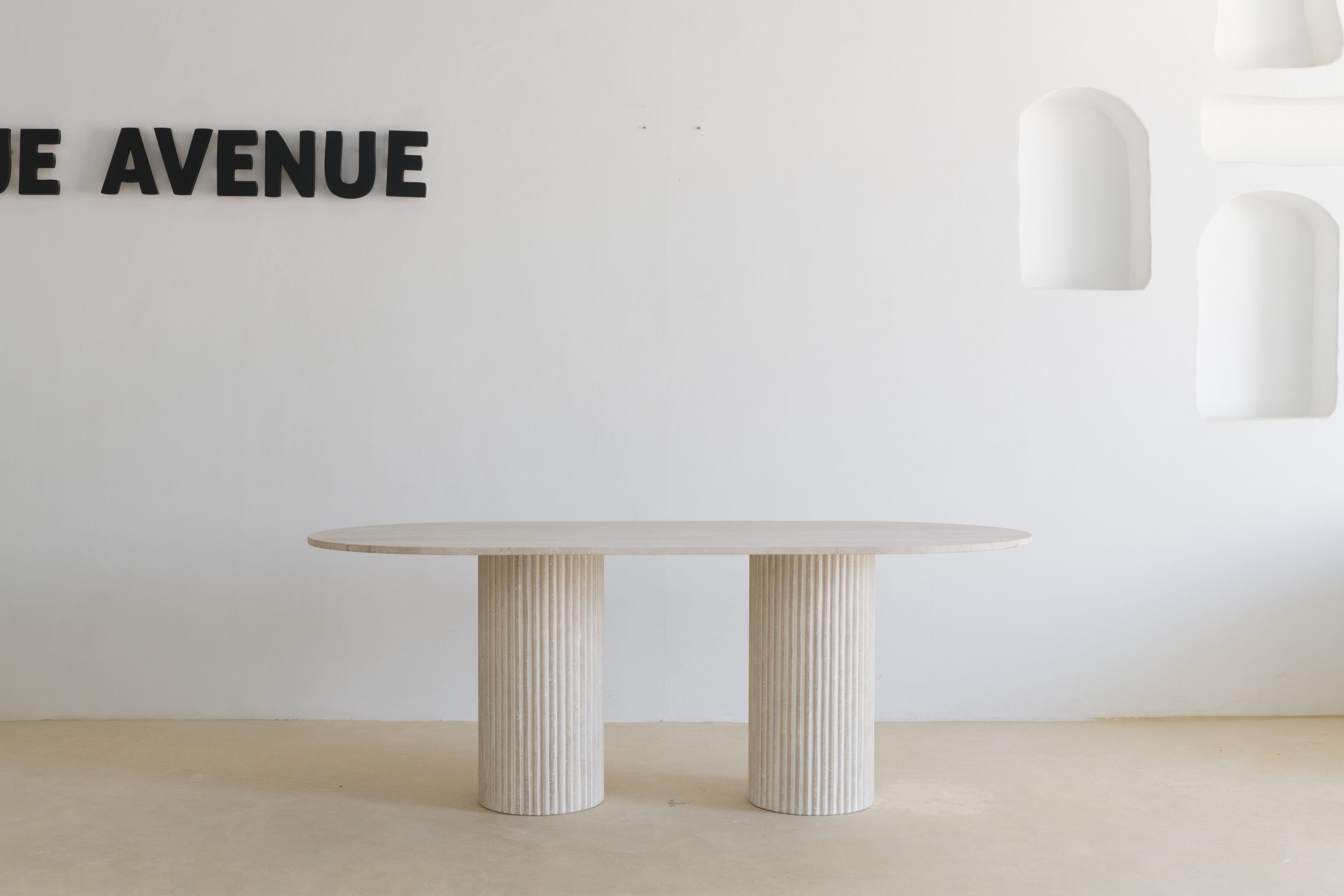 Olya oblong dining table 150x90 in natural travertine