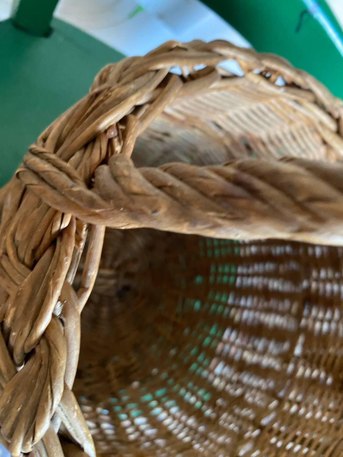 Round wicker basket in a bohemian style.