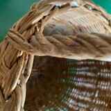 Round wicker basket in a bohemian style.