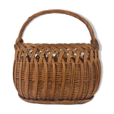 Old woven wicker shopping cart