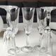 Lot 5 Grandes Flûtes à champagne en cristal taillé. Motifs gouttes/pointes diamant. Haut 20,5 cm