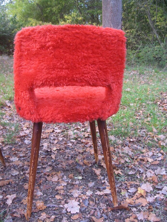 2 chairs red rug seventies